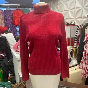 Red cable knit turtleneck sweater